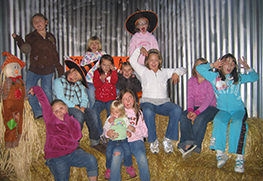 Kids on hay bales